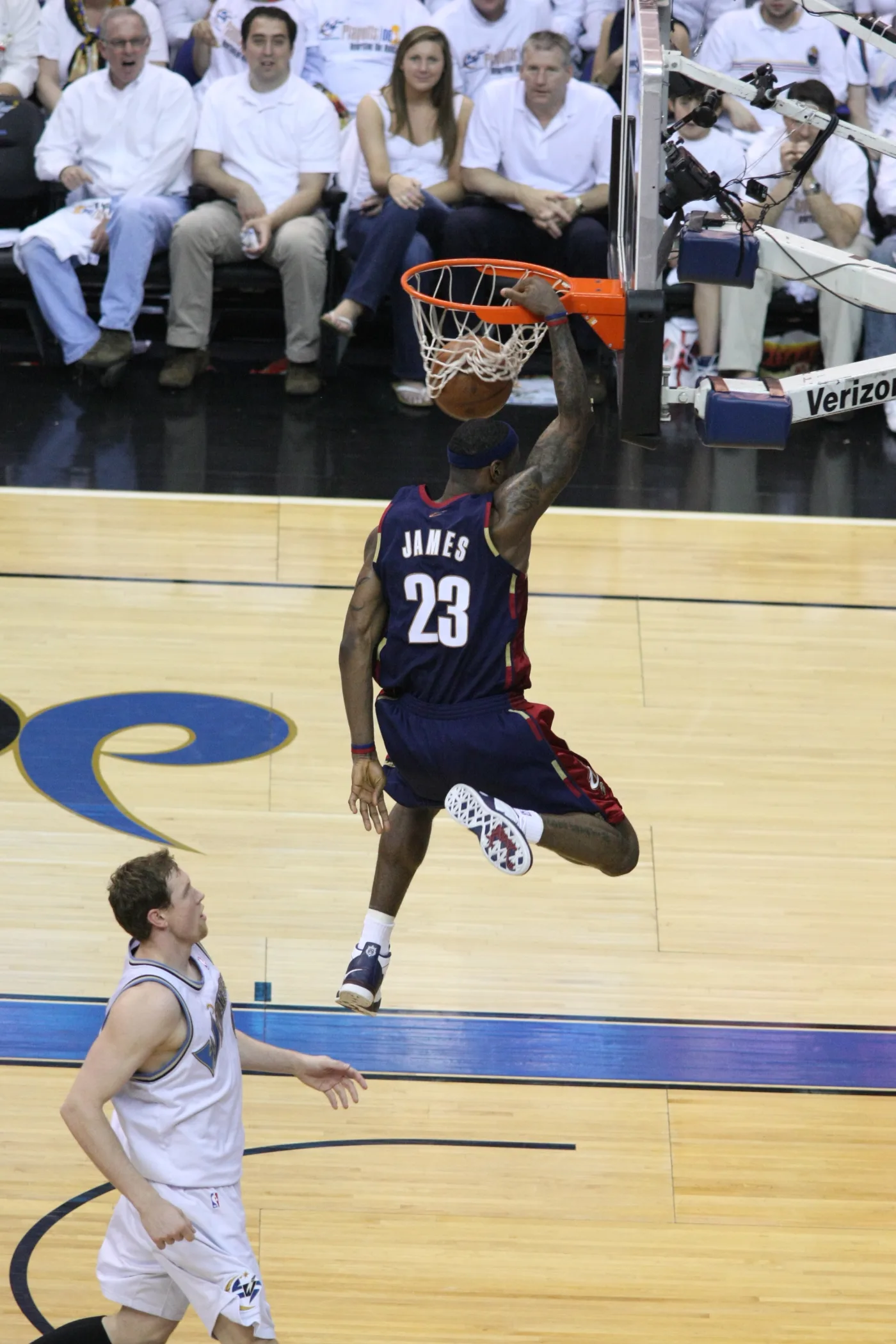 LeBron James, seen from behind in a number 23 Cavaliers uniform, dunking in Washington.